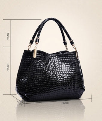 Schultertasche mit Krokodilmuster