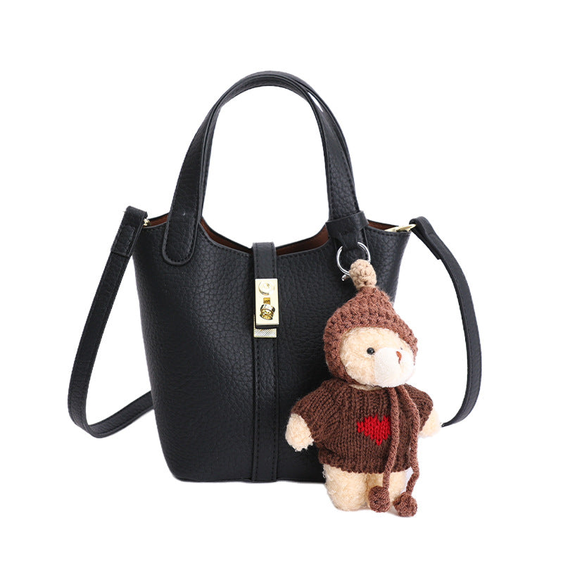 Damen Mini-Handtasche mit verspieltem Tieranhänger