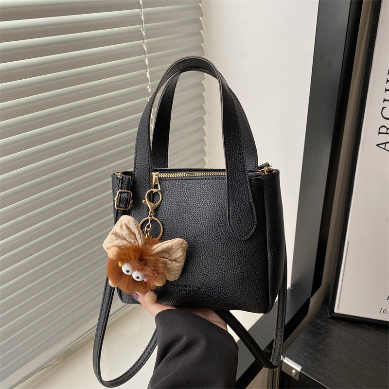 Damen Mini-Tasche mit verspieltem Tieranhänger