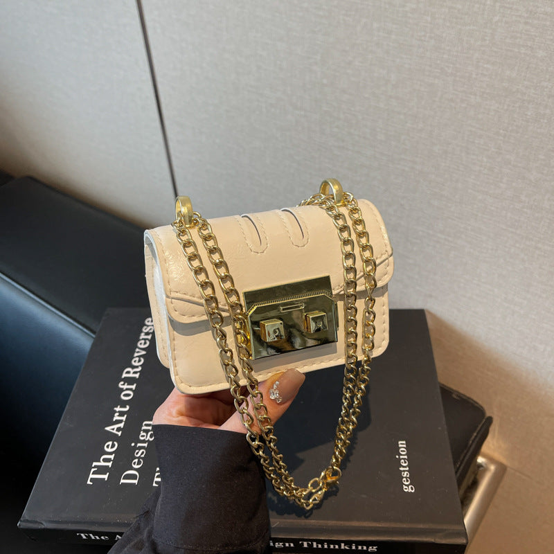 Damen elegante Mini-Handtasche mit goldener Verschlussmechanismus