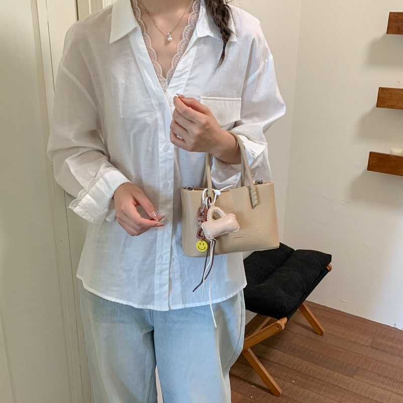 Damen Mini-Handtasche mit modischem Kordelzug