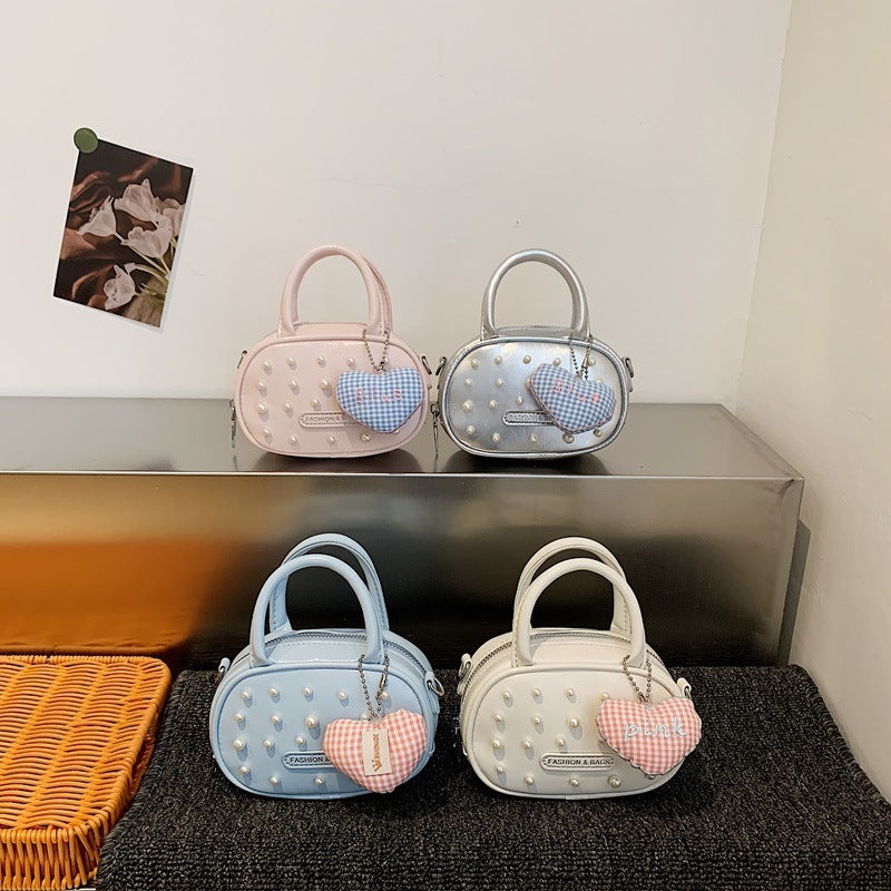 Damen trendige Mini-Handtasche mit auffälligen Perlenapplikationen