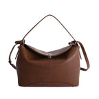 Damenhandtasche mit flexiblem Riemen und elegantem Design