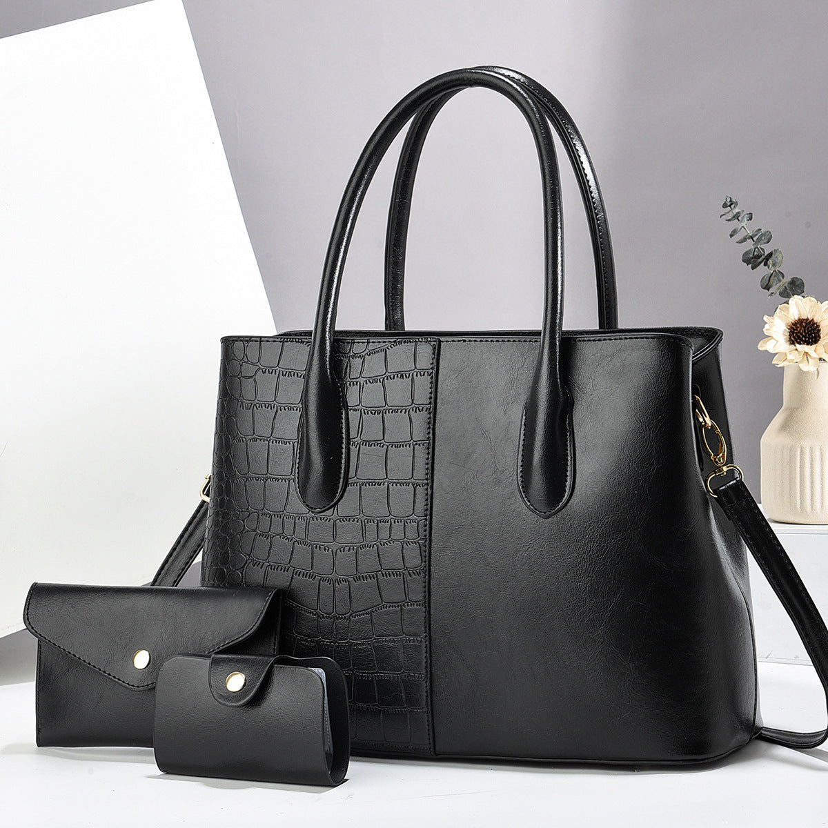 Damentasche mit abnehmbaren Accessoires