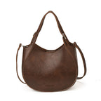 Damen Schultertasche aus hochwertigem Kunstleder mit modischem Besatz