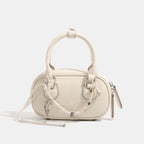Damen Mini-Handtasche mit verspieltem Kordelzug und eleganten Akzenten