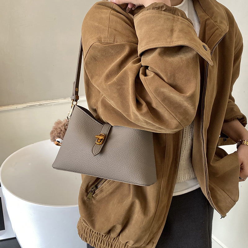 Damen multifunktionale Schultertasche mit verspieltem Charme