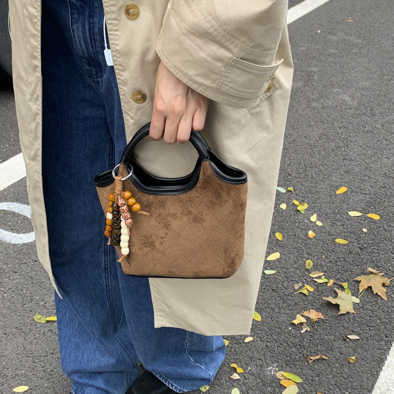 Damen elegante Handtasche aus hochwertigem Wildleder und Lederakzenten