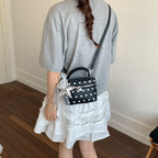 Damen Mini-Handtasche mit verspieltem Design und eleganten Akzenten