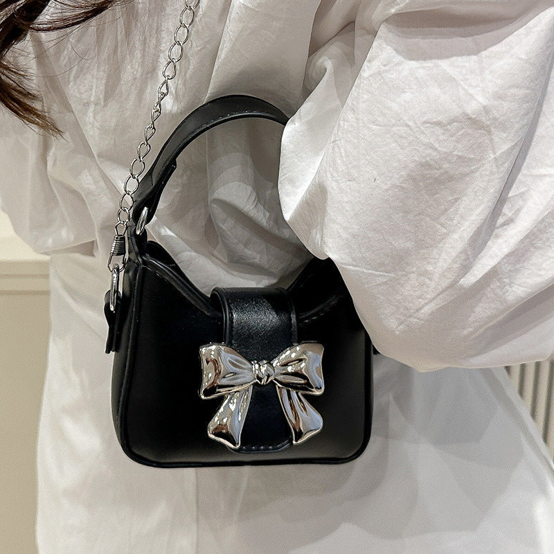 Damen Mini-Handtasche mit stylischem Schleifenverschluss