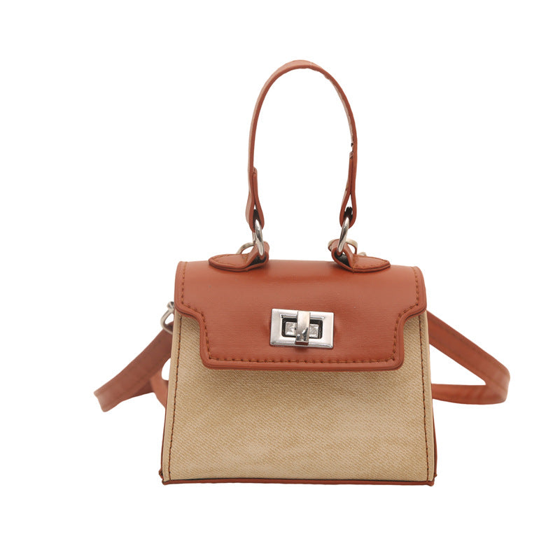 Damen Mini-Handtasche mit luxuriösem Lederlook und praktischen Traggriffen