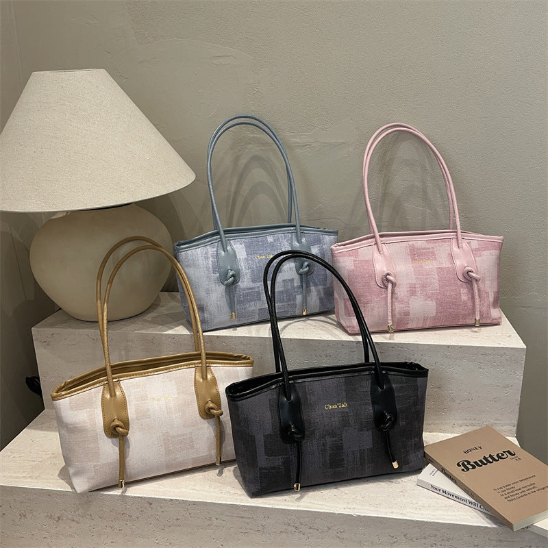 Damen elegante Handtasche aus strukturiertem Material