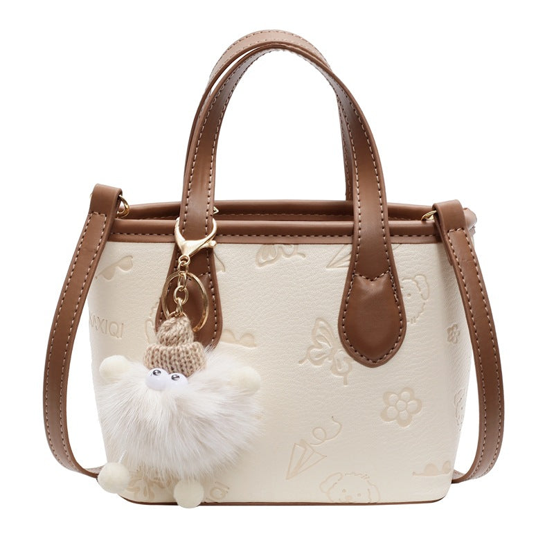 Damen Mini-Handtasche mit süßem Anhänger