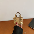 Damen Mini-Handtasche mit aufwendigem Strukturdesign