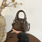 Damen Mini-Handtasche mit glänzender Oberfläche und modischem Reißverschluss