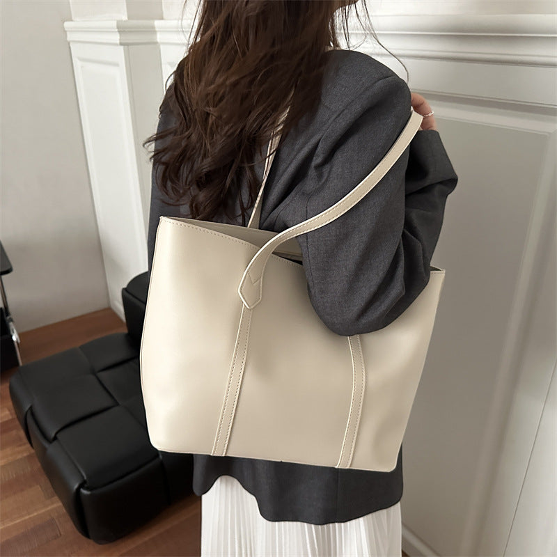 Damen elegante Tragetasche mit minimalistischer Struktur