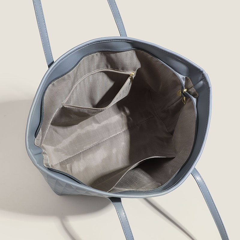 Damentasche mit elegantem Diamantdesign und praktischen Innenfächern