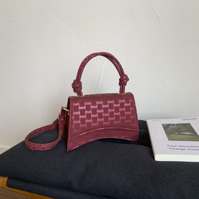 Damen Mini-Handtasche mit anspruchsvollem Logodesign