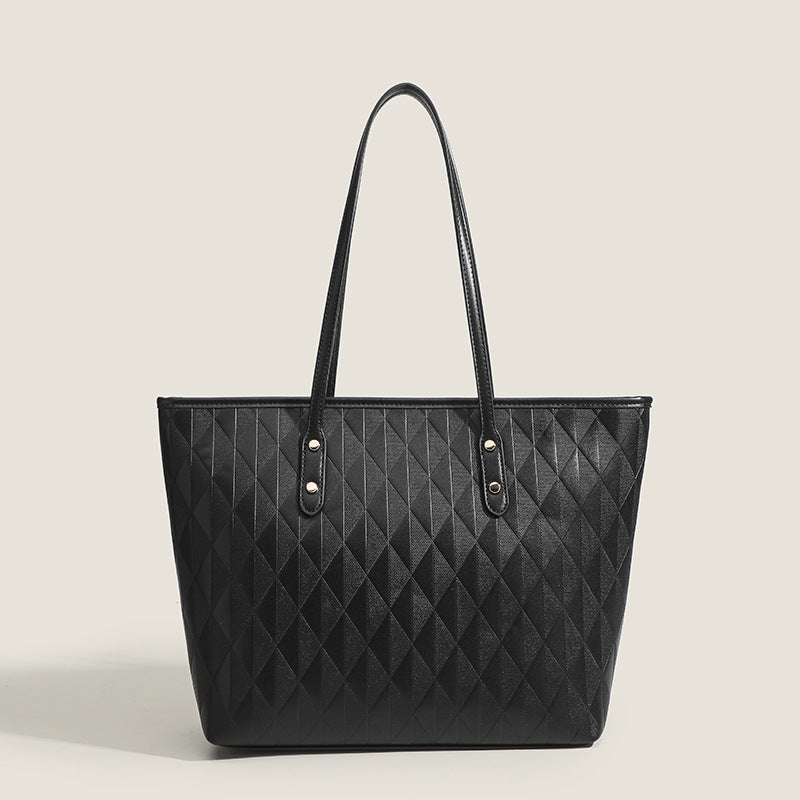 Damentasche mit elegantem Diamantdesign und praktischen Innenfächern