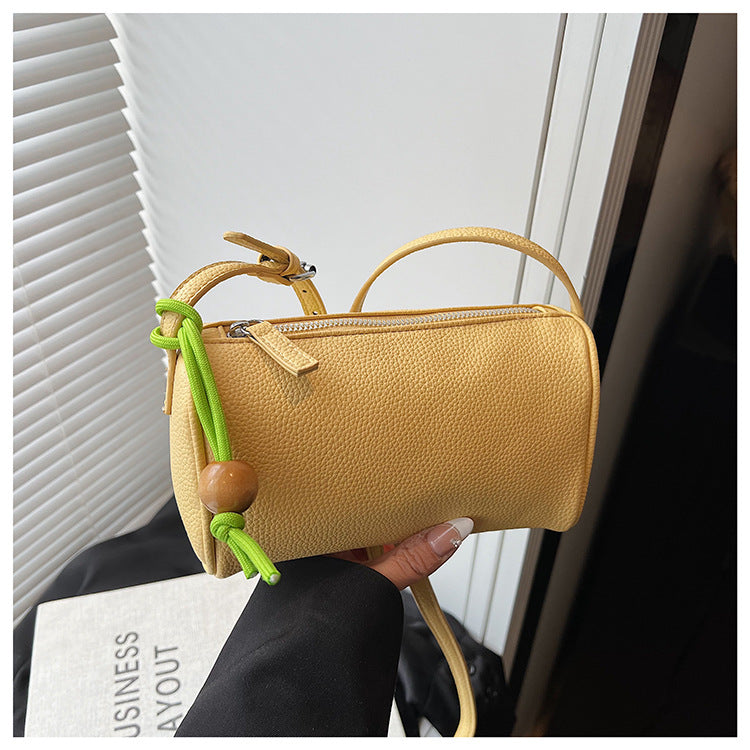 Damen Schultertasche aus hochwertigem synthetischem Leder mit buntem Kordelzug