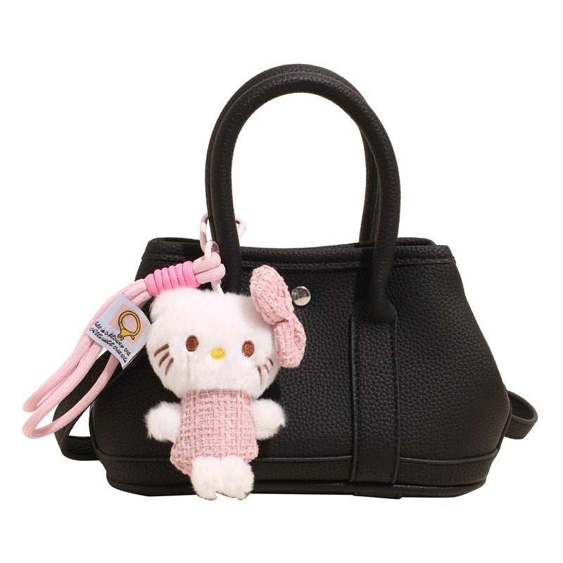 Damen Mini-Handtasche mit verspieltem Plüschanhänger