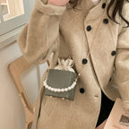 Damen stilvolle Mini-Handtasche mit Kordelzug und Perlenakzent