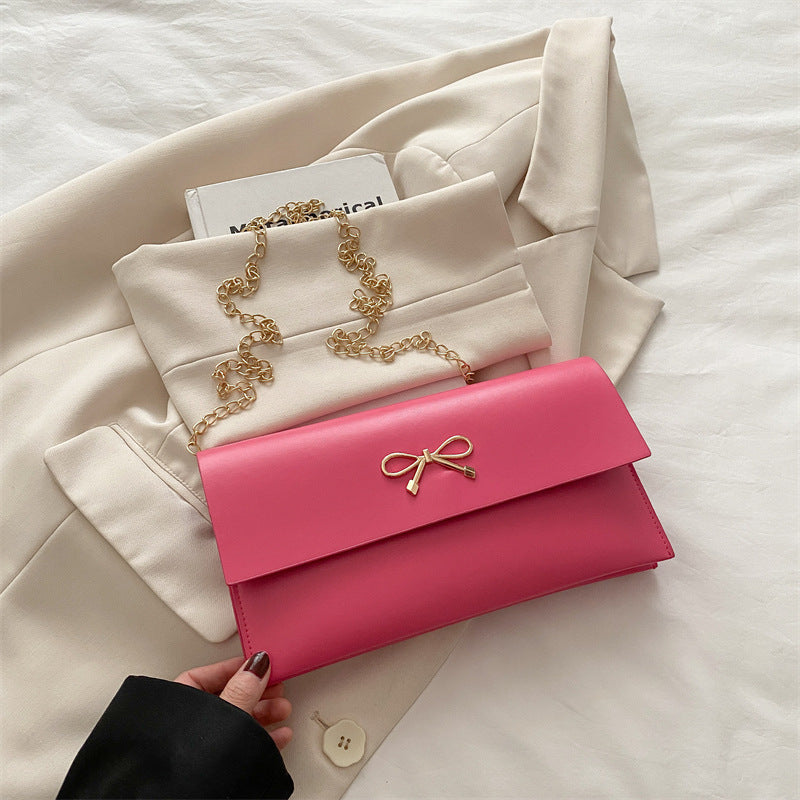 Damen elegante Clutch im minimalistischen Design mit goldenen Akzenten