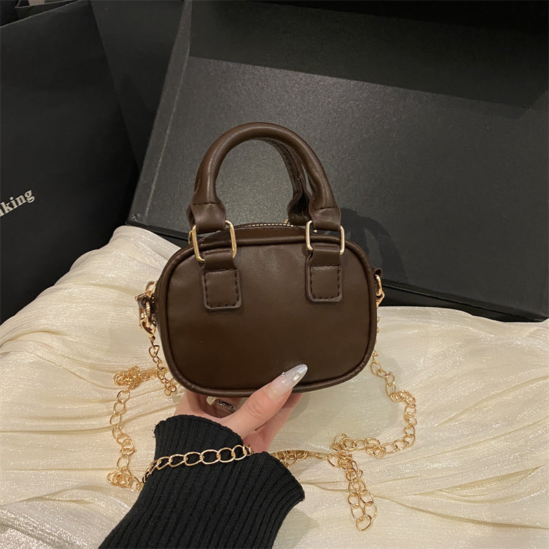 Damen Mini-Handtasche mit abnehmbarem Kettenriemen und elegantem Design