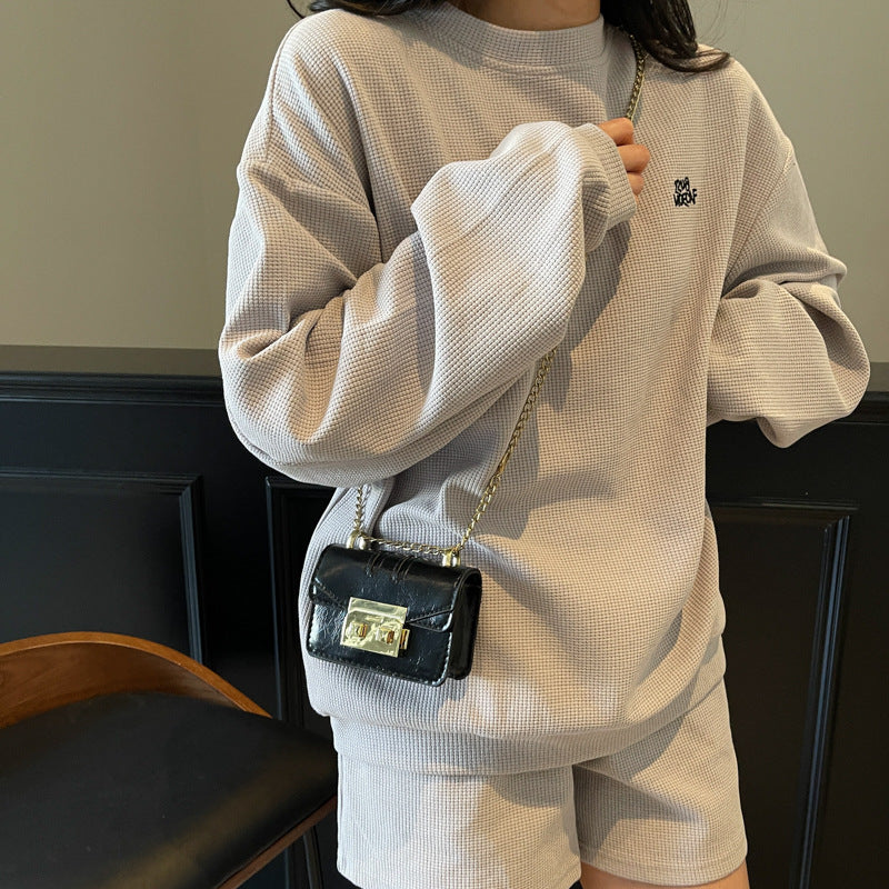 Damen elegante Mini-Handtasche mit goldener Verschlussmechanismus