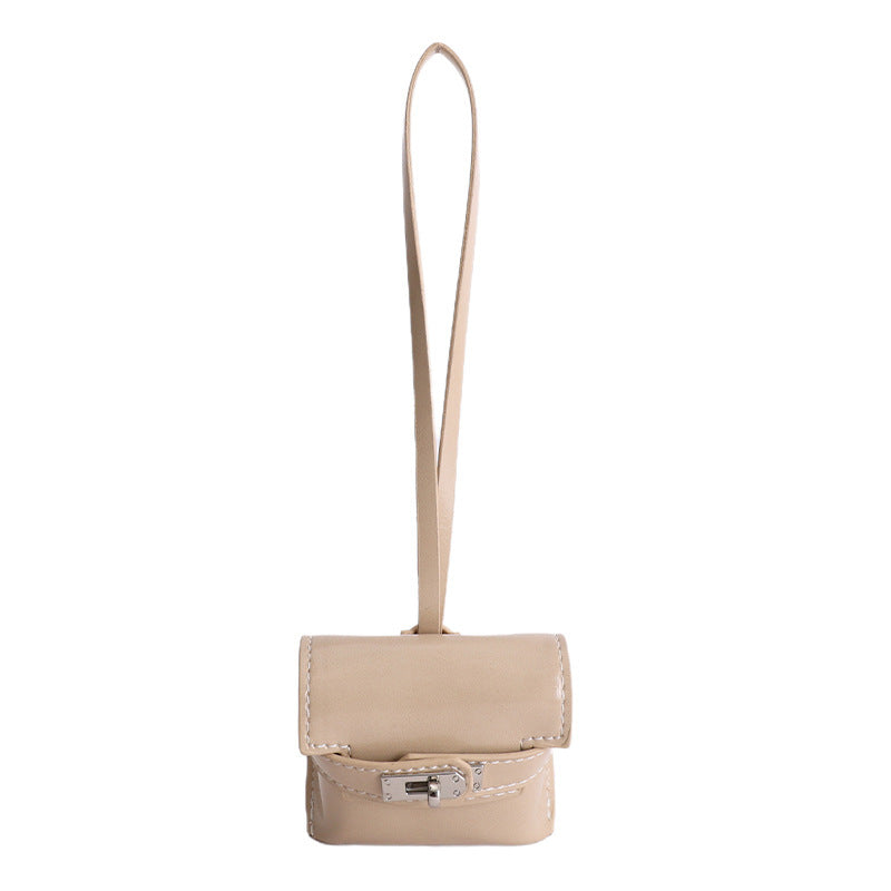 Damen Mini-Handtasche aus hochwertigem Kunstleder mit verspieltem Verschluss