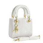Damen elegante Mini-Handtasche im modernen Schlangenhaut-Look mit abnehmbarem Schultergurt