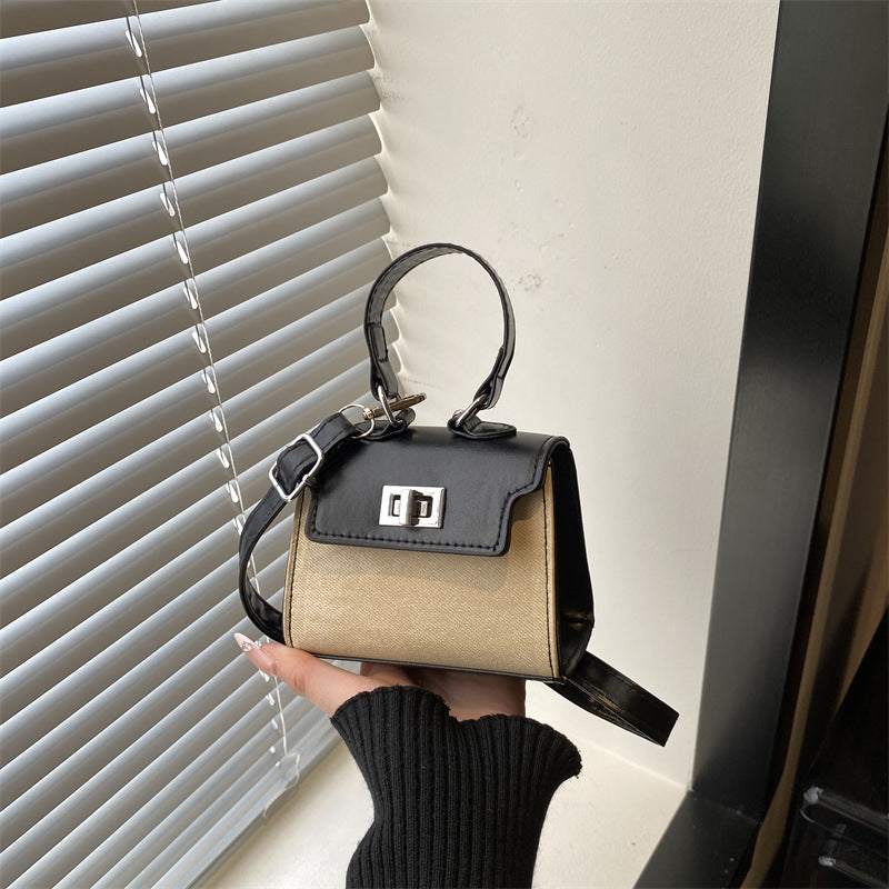 Damen Mini-Handtasche mit luxuriösem Lederlook und praktischen Traggriffen