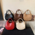 Damen Schultertasche aus hochwertigem Kunstleder mit modischem Besatz