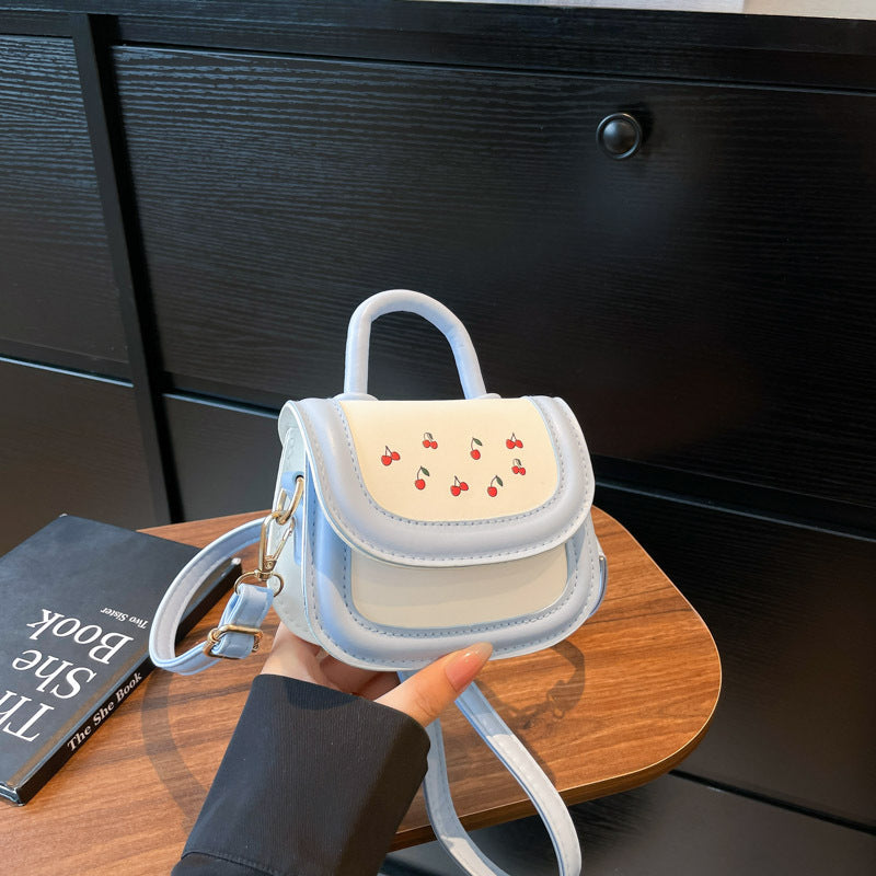 Damen Mini-Handtasche mit fröhlichem Kirschdesign und charmanten Anhängern