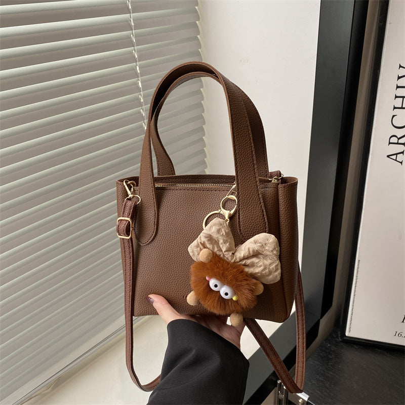 Damen Mini-Tasche mit verspieltem Tieranhänger