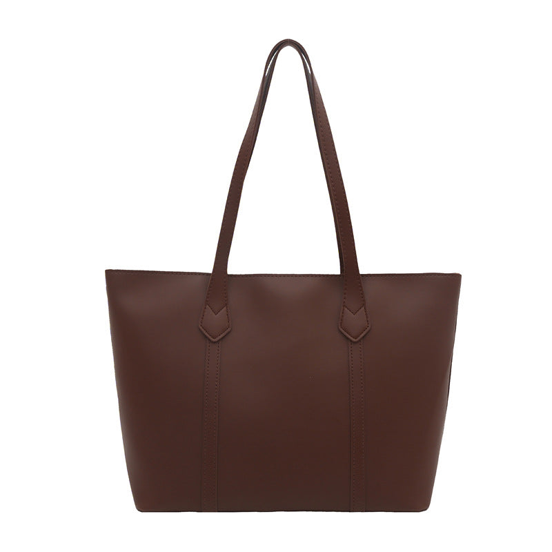 Damen elegante Tragetasche mit minimalistischer Struktur