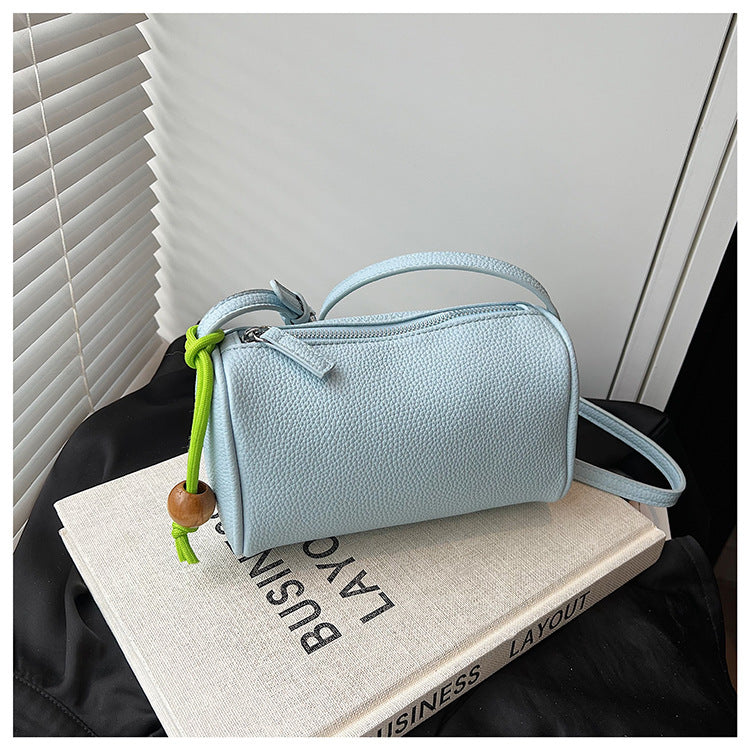 Damen Schultertasche aus hochwertigem synthetischem Leder mit buntem Kordelzug