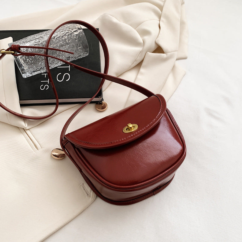 Damen Schultertasche im eleganten Retro-Design mit goldenen Akzenten