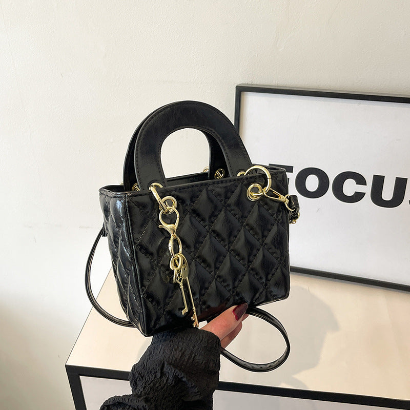 Damen elegante Mini-Handtasche mit gestepptem Design