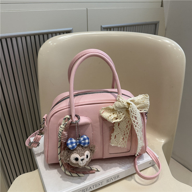 Damen Mini-Handtasche mit verspieltem Tiermotiv und charmantem Anhänger