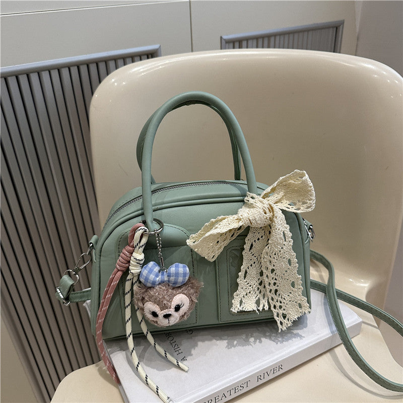 Damen Mini-Handtasche mit verspieltem Tiermotiv und charmantem Anhänger