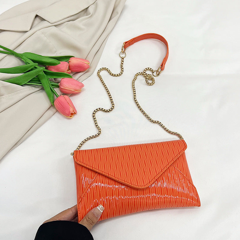 Damen elegante Clutch mit glänzendem Obermaterial