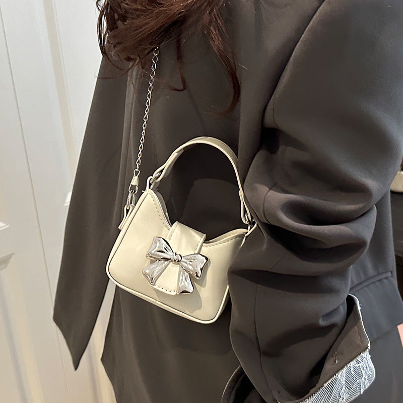 Damen Mini-Handtasche mit stylischem Schleifenverschluss