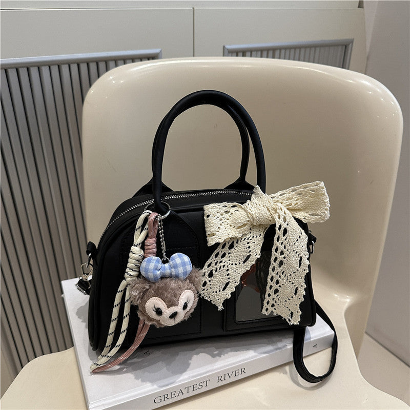 Damen Mini-Handtasche mit verspieltem Tiermotiv und charmantem Anhänger