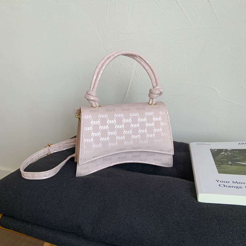 Damen Mini-Handtasche mit anspruchsvollem Logodesign
