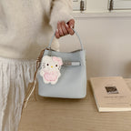 Damen Mini-Handtasche mit süßem Anhänger