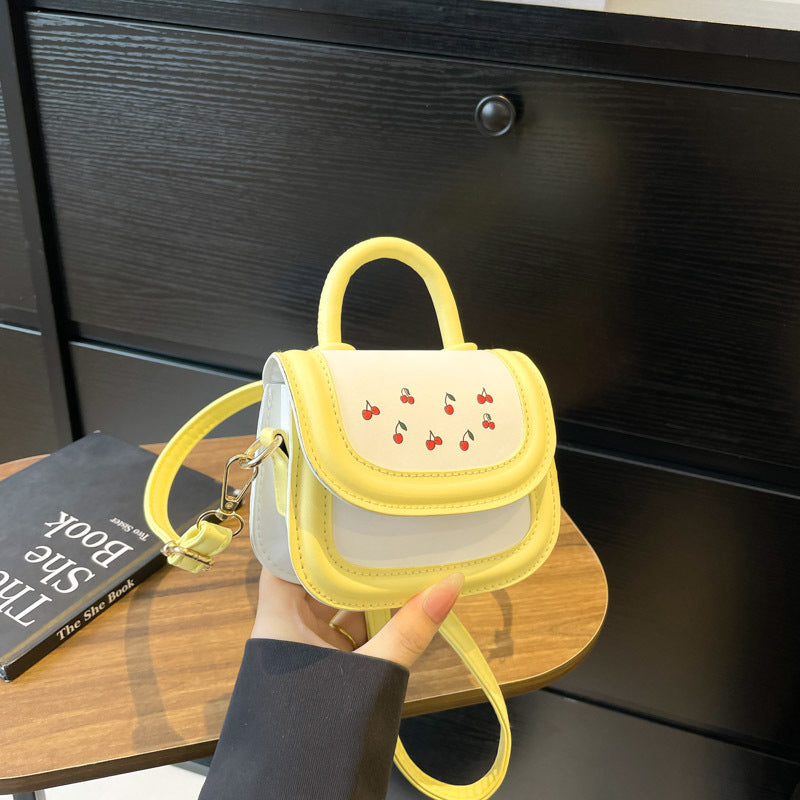Damen Mini-Handtasche mit fröhlichem Kirschdesign und charmanten Anhängern