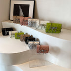 Damen-Mini-Handtasche mit luxuriösem, gestepptem Muster und funkeldem Kettenanhänger