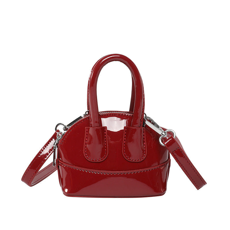Damen Mini-Handtasche mit eleganter glänzender Oberfläche und abnehmbarem Schultergurt