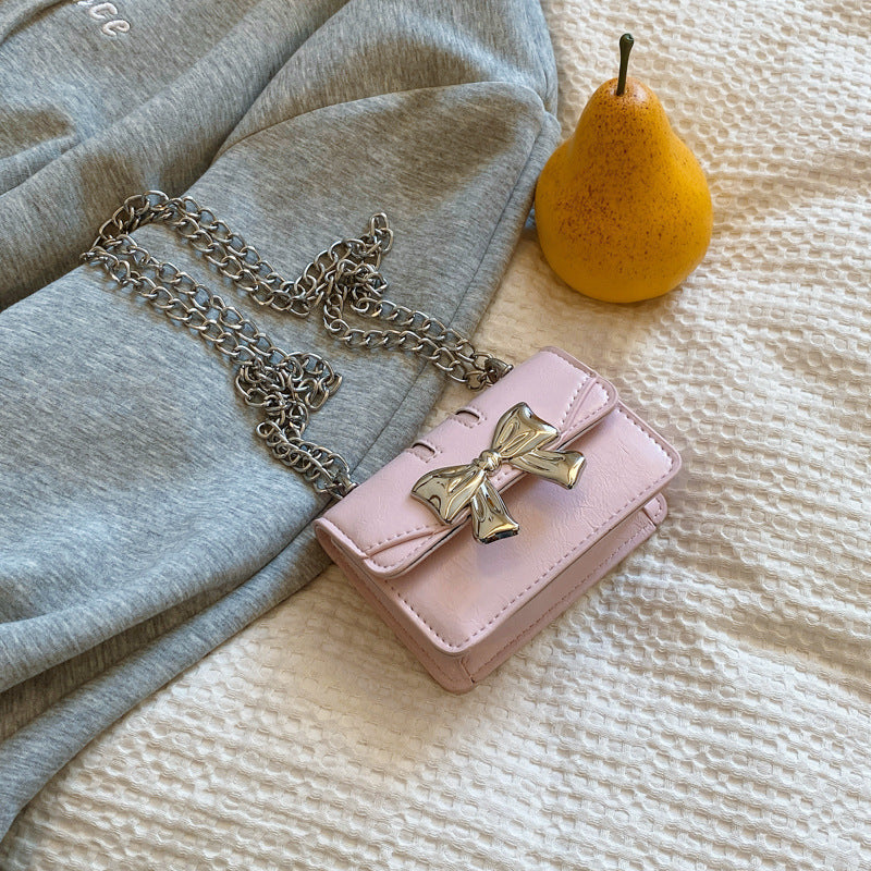 Damen Mini-Handtasche mit schimmerndem Schleifenverschluss